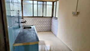 Kitchen in 1.5 BHK Apartment at Pratiraksha Nagar CHS, Santacruz East – for Rent