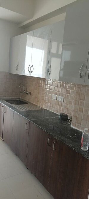 Kitchen in 3 BHK Apartment at Amrapali Heartbeat City, Sector 107 – for Rent
