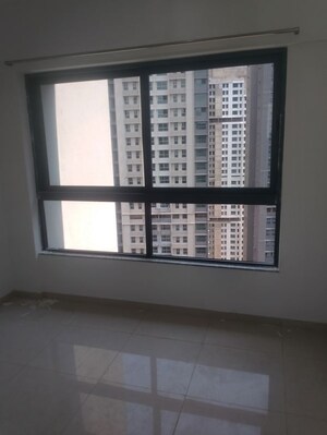 Room in 2 BHK Apartment at Kalpataru Immensa G, Kolshet Road – for Sale