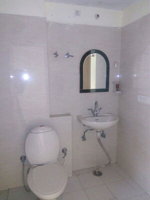 Bathroom in 3 BHK Apartment at Rohtas Plumeria, Gomti Nagar – for Rent