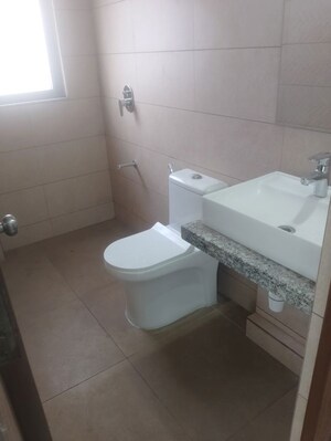Bathroom in 2 BHK Apartment at Kalpataru Immensa, Kolshet Road – for Rent
