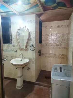 Bathroom in 2 BHK Apartment at Siddhanchal CHS, Pawar Nagar – for Rent