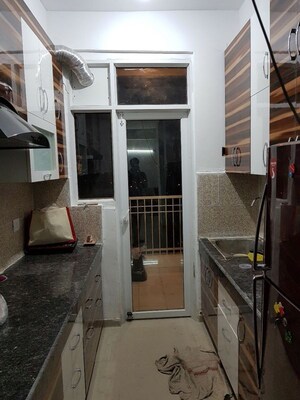 Kitchen in 2 BHK Apartment at Gaur City 7th Avenue, Sector 4 Greater Noida – for Rent
