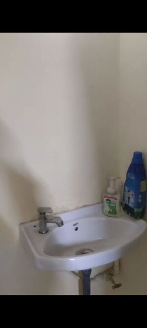 Bathroom in 1 BHK Apartment at Bhudargad CHS, Andheri West – for Rent