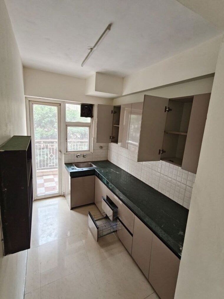 Kitchen, shree-vardhman-green-court 2 Bedroom 690 Sq.Ft. Apartment In Sector 90 Gurgaon 10234998