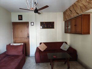 Living Room in 1 BHK Apartment at Flower Valley Complex, Khopat – for Rent