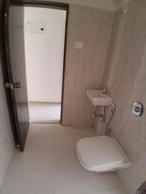 Bathroom in 1 BHK Apartment at Puranik Grand Central, Vartak Nagar – for Rent