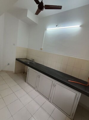 Kitchen in 1 BHK Apartment at Tata Glendale, Vasant Vihar – for Sale