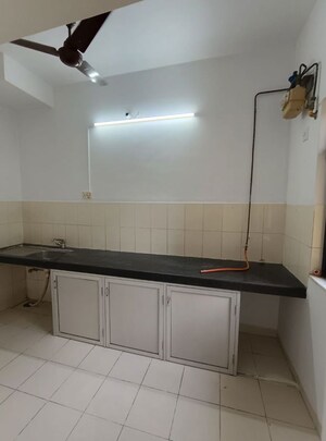 Kitchen in 1 BHK Apartment at Tata Glendale, Vasant Vihar – for Sale
