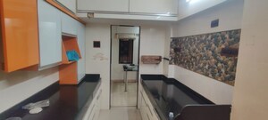Kitchen in 2 BHK Apartment at Cosmos Paradise Complex, Thane West – for Rent