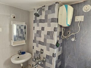 Bathroom in 3 BHK Apartment at Siddharth Nagar – for Rent