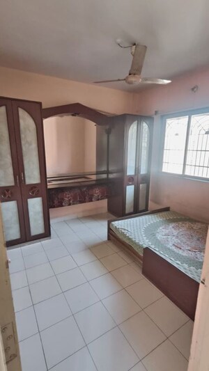 Bedroom in 2 BHK Apartment at Vijay Nagari Annex, Waghbil – for Rent