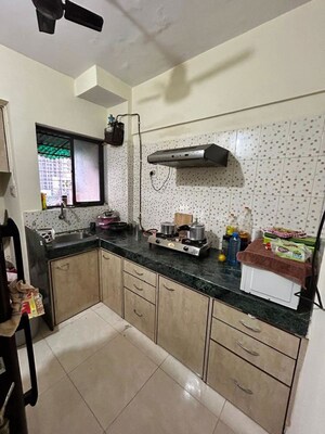 Kitchen in 1 BHK Apartment at Rutu Enclave, Kasarvadavali – for Rent