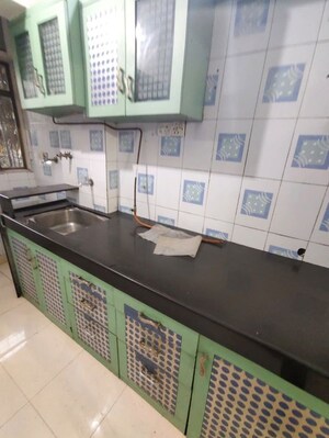 Kitchen in 2 BHK Apartment at Vijay Apartments Waghbil, Waghbil – for Rent