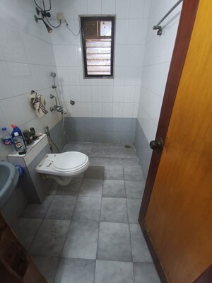 Bathroom in 3 BHK Apartment at Vikas Park CHS, Malad West – for Rent