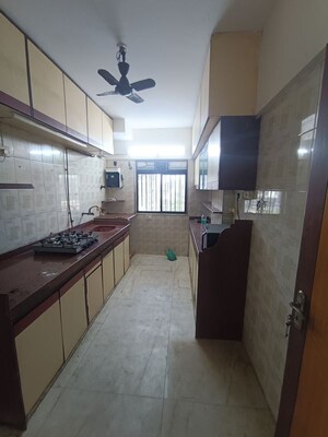 Kitchen in 3 BHK Apartment at Vikas Park CHS, Malad West – for Rent