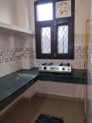 Kitchen in 1 BHK Apartment at Khirki Extension – for Rent