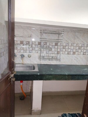 Kitchen in 1 BHK Apartment at Khirki Extension – for Rent