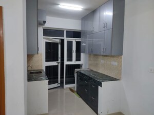 Kitchen in 2 BHK Apartment at Adani Aangan, Sector 89a – for Sale