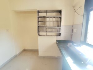 Kitchen in 1 RK Apartment at Haware Citi, Ghodbunder Road – for Rent