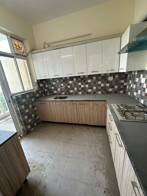Kitchen in 4 BHK Builder Floor at Ansal API Esencia, Sector 67 – for Sale