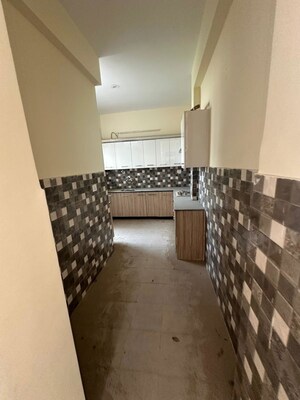 Kitchen in 4 BHK Builder Floor at Ansal API Esencia, Sector 67 – for Sale