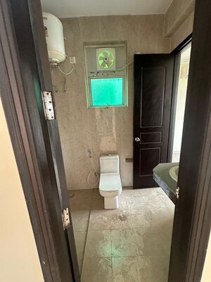 Bathroom in 4 BHK Builder Floor at Ansal API Esencia, Sector 67 – for Sale