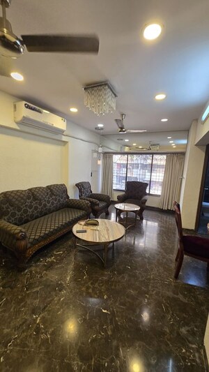 Living Room in 2 BHK Apartment at Manju Tower CHS, Andheri West – for Rent