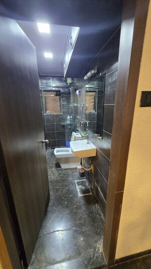 Kitchen in 2 BHK Apartment at Manju Tower CHS, Andheri West – for Rent