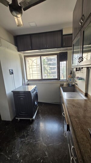 Kitchen in 2 BHK Apartment at Manju Tower CHS, Andheri West – for Rent