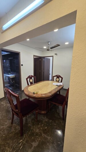 Living Room in 2 BHK Apartment at Manju Tower CHS, Andheri West – for Rent