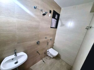 Bathroom in 2 BHK Apartment at Unique Youtopia, Kharadi – for Rent