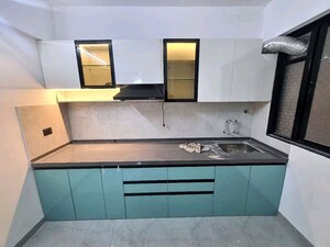 Kitchen in 2 BHK Apartment at Unique Youtopia, Kharadi – for Rent