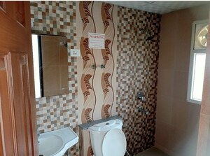 Bathroom in 3 BHK Apartment at Purvanchal Royal City, Chi V Greater Noida – for Rent