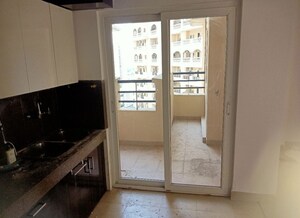 Kitchen in 3 BHK Apartment at Purvanchal Royal City, Chi V Greater Noida – for Rent