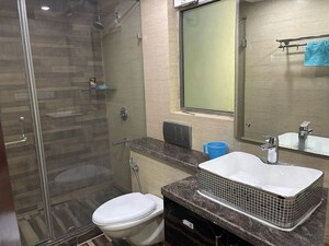 Bathroom in 3 BHK Apartment at Parsvnath Exotica, Sector 53 – for Rent