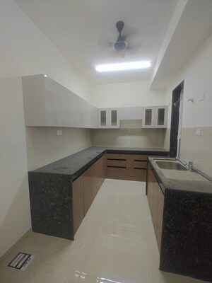 Kitchen in 2.5 BHK Apartment at Seawoods Sector 40 – for Sale