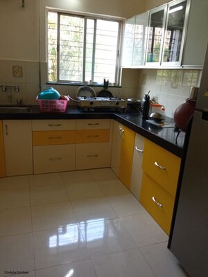 Kitchen in 2 BHK Apartment at Gulmohar Paradise Homes, Kharadi – for Rent