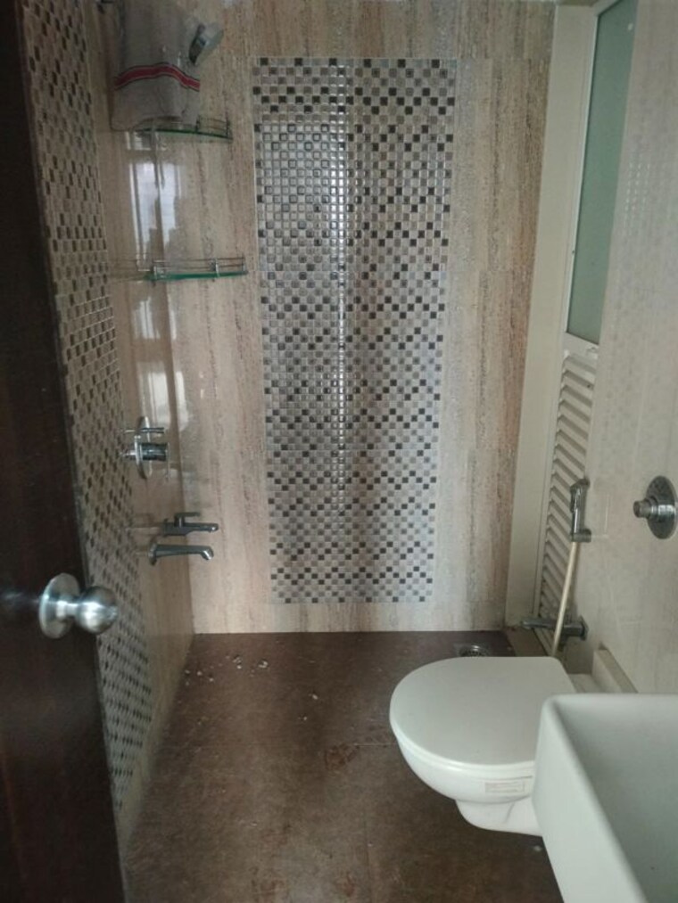 Bathroom, shree-ganesha-veera-residency 2 Bedroom 700 Sq.Ft. Apartment In Ghodbunder Road Thane 10235634