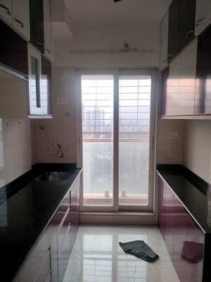 Kitchen in 2 BHK Apartment at Shree Ganesha Veera Residency, Ghodbunder Road – for Rent