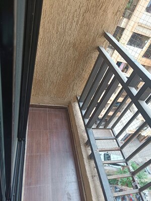 Balcony in 1 BHK Apartment at Raunak Unnathi Woods, Ghodbunder Road – for Sale
