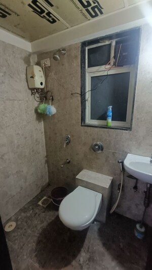 Bathroom in 1 BHK Apartment at Sahajanand Athena, Goregaon West – for Rent