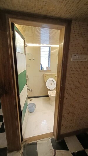 Bathroom in 1 BHK Apartment at Devprayag CHS, Andheri West – for Rent