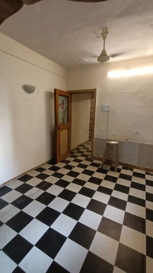 Bedroom in 1 BHK Apartment at Devprayag CHS, Andheri West – for Rent