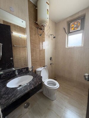 Bathroom in 4 BHK Builder Floor at Ansal API Esencia, Sector 67 – for Sale
