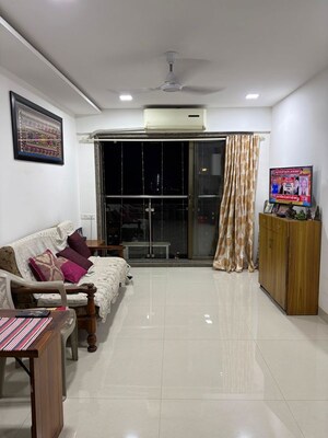 Living Room in 1 BHK Apartment at Neminath Imperia, Andheri West – for Rent