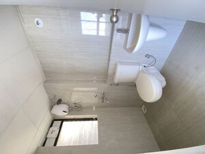 Bathroom in 2 BHK Apartment at Runwal Gardens, Dombivli East – for Sale