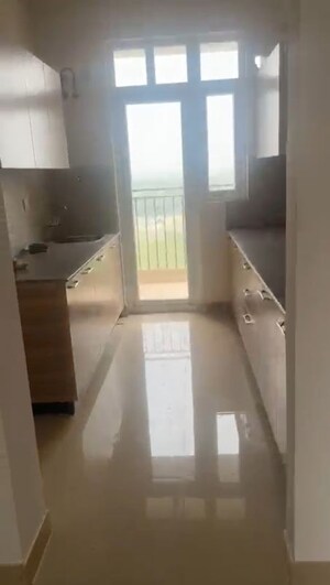 Kitchen in 3 BHK Apartment at ATS Homekraft Pious Hideaways, Sector 150 – for Rent