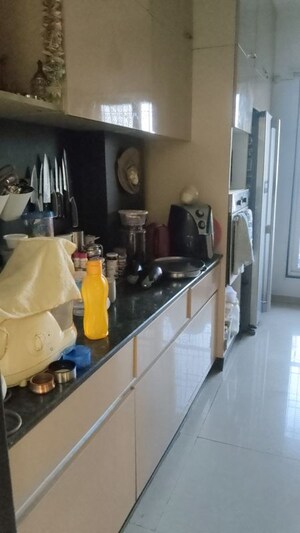 Kitchen in 2.5 BHK Apartment at Anmol Heights, Naupada – for Sale