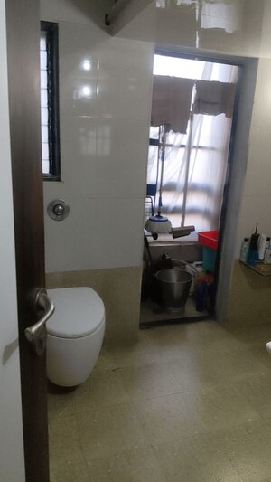 Bathroom in 2.5 BHK Apartment at Anmol Heights, Naupada – for Sale